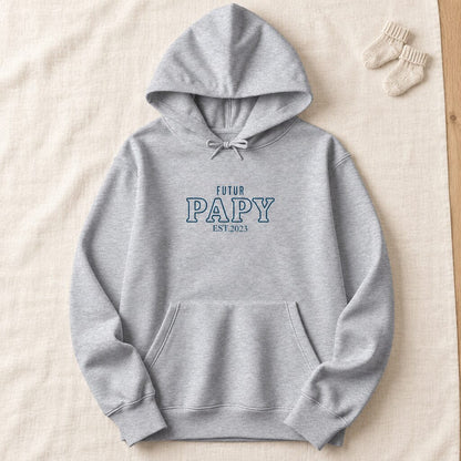 Sweat à capuche personnalisé Futur Papy gris présenté à plat